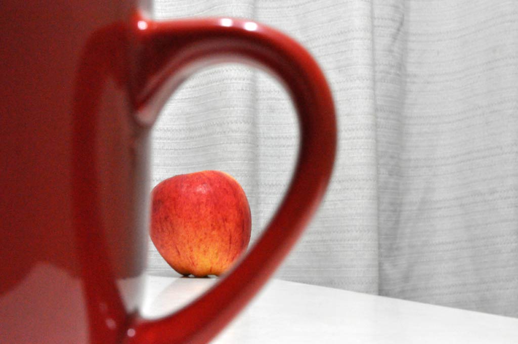 Apple and mug handle